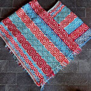 Handmade Mosaic Crochet Wool Poncho in reds, blues and beige